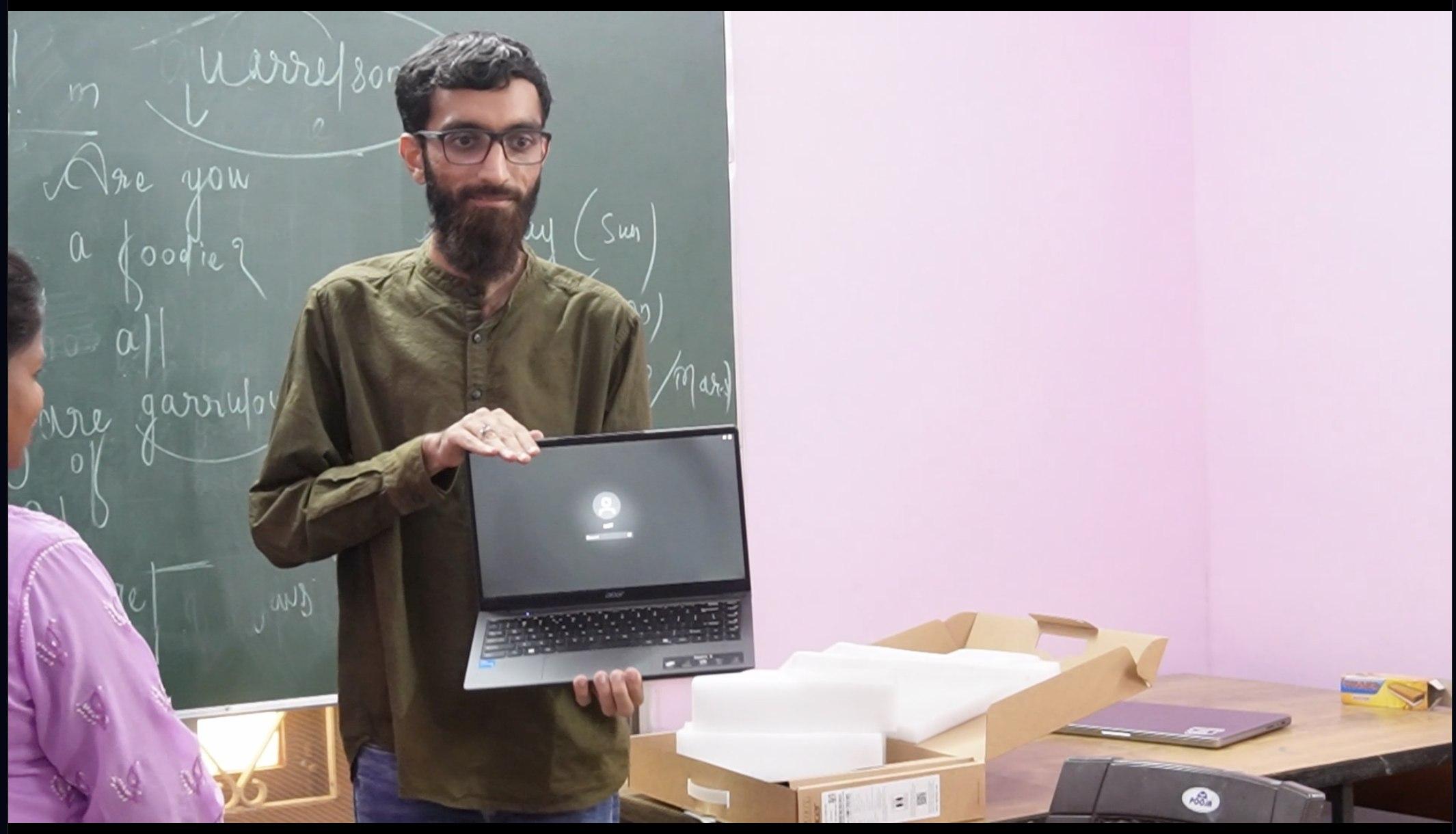 Showing the laptop